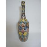 Morrocan Safi multi coloured vase of long narrow neck, signed mark to base. 49cm in Height