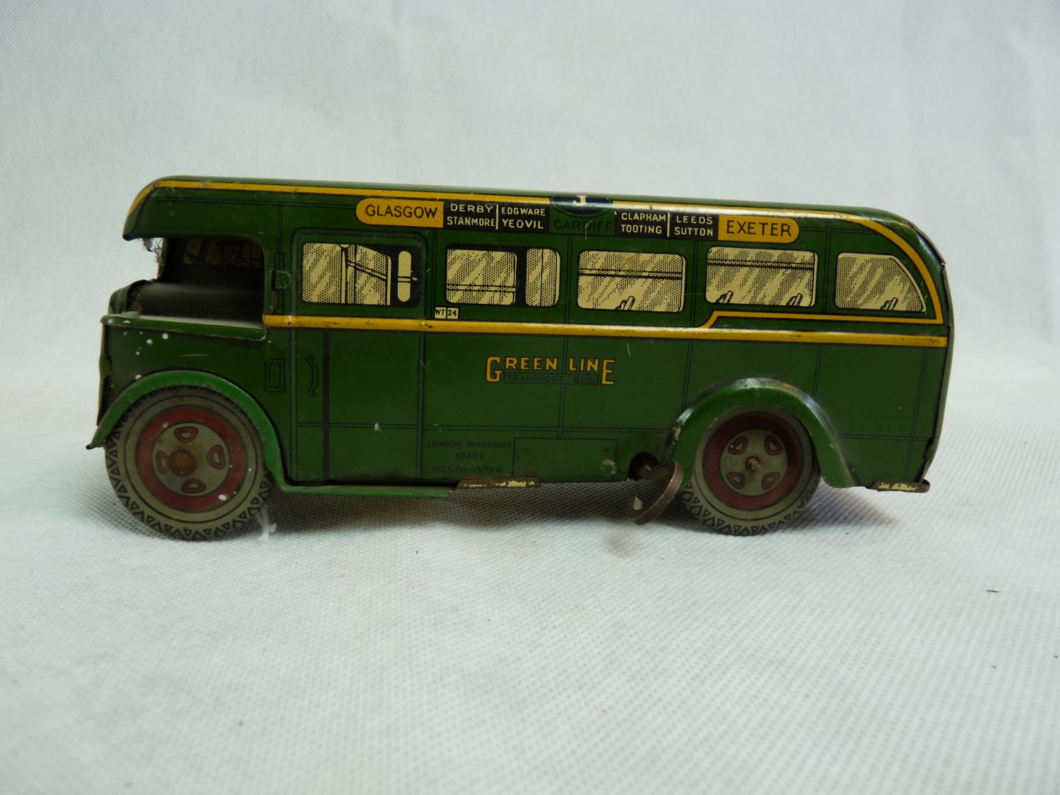 A Wells Brim Toy tin plate and clockwork Green Line bus comprising dark green with yellow trim, - Image 2 of 2