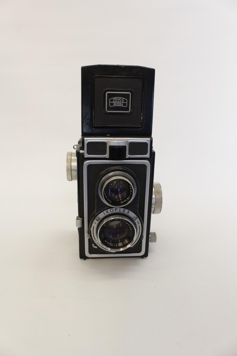 Zeiss Ikon Ikoflex twin reflex camera with brown leather fitted case marked 1249/16