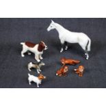 Collection of Beswick figurines inc Dapple Grey Horse, Spaniel, Terrier, Alsatian and 3 Foxes.