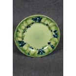 Rare Moorcroft Celadon Leaf and Berry design plate of green ground design and signed by William