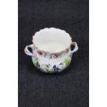 Good Quality European Porcelain two handled Jardiniere with Swan and Flora decoration on basket