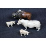 A Beswick model of a Charolais bull, cream gloss, 12.7cm, and two Beswick Charolais calf, cream