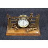 Interesting early 20thC mantel clock stylised as a Farm gate with Fox hunting scene, 16cm in height.