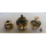 A Royal Worcester lidded vase and cover, similar vase and a Hadleys Worcester pot pourri vase all