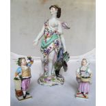 A pair of Meissen figures lady and gentleman picking grapes and a Continental figure winged lady (