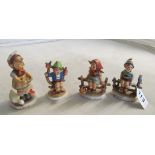 Four Hummel figures