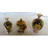 A Royal Worcester pot pourri vase with pierced gilt lid hand painted roses (slight chip to lid)