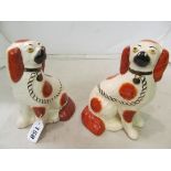 A pair of Staffordshire comforter dogs