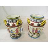 A pair of Italian majolica urn shaped vases decorated dancing figures