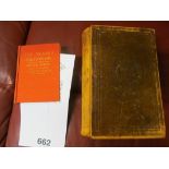 A leather Holy Bible and nurse's dictionary.