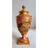 A Royal Crown Derby 'Majestic' shaped vase pink ground decorated with gilt and coloured flowers, the