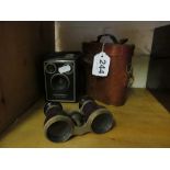 A box Brownie camera and 2 pairs of binoculars