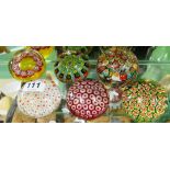 Six various Millefiori paperweights.