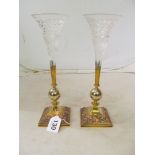 A pair brass, copper and glass spill vases.