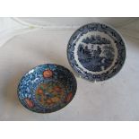 A blue and white plate and Japanese style blue bowl