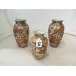 A pair of Japanese Imari vases and another