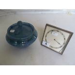 An 8 Day freestanding night clock and a blue lidded powder bowl.