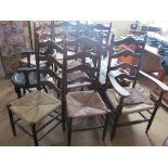 Eight ladder back chairs (slightly a/f)