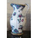 A Losol ware ewer decorated pink flowers