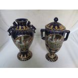 A blue and gilt lidded vase and another vase both decorated scenes of ladies