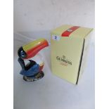 A Guinness Toucan money box (boxed)