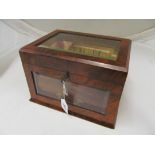 A Victorian walnut jewellery box with glass top and front