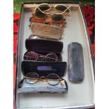 A pair of horn rimmed spectacles, pair of pince-nez and other antique glasses.