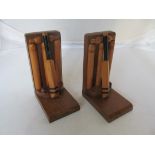 A pair of Thornton Smith bookends as cricket stumps, bat and ball