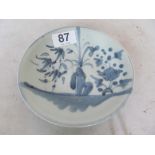 A Chinese blue and white dish from the Tek Sing boat bearing Nagel Auctions label