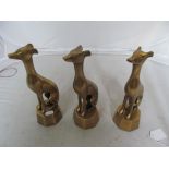 Three brass dogs