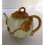 A Royal Worcester tea pot.