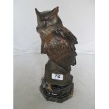 A cold painted owl on marble base