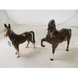 A Royal Doulton and another horse