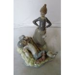 A Lladro model of boy asleep and lady.