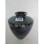 A blue lustre glass vase