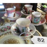 Four miniature Meissen style cups and saucers decorated courting couples