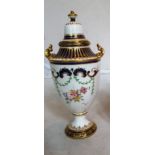 A Royal Crown Derby two handled lidded vase decorated flowers and blue and gilt neck and handles