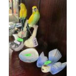 A Royal Copenhagen Sparrow, a pottery Budgie a bird and a blue and white shell shaped dish.