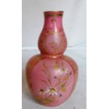 A Victorian gourd shaped Derby vase pink ground with reserves of flowers