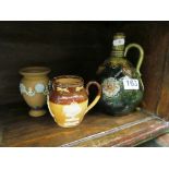 A Royal Doulton flask (no stopper) of green ground applied decoration, and a stoneware jug and