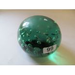 A large bubble glass paperweight