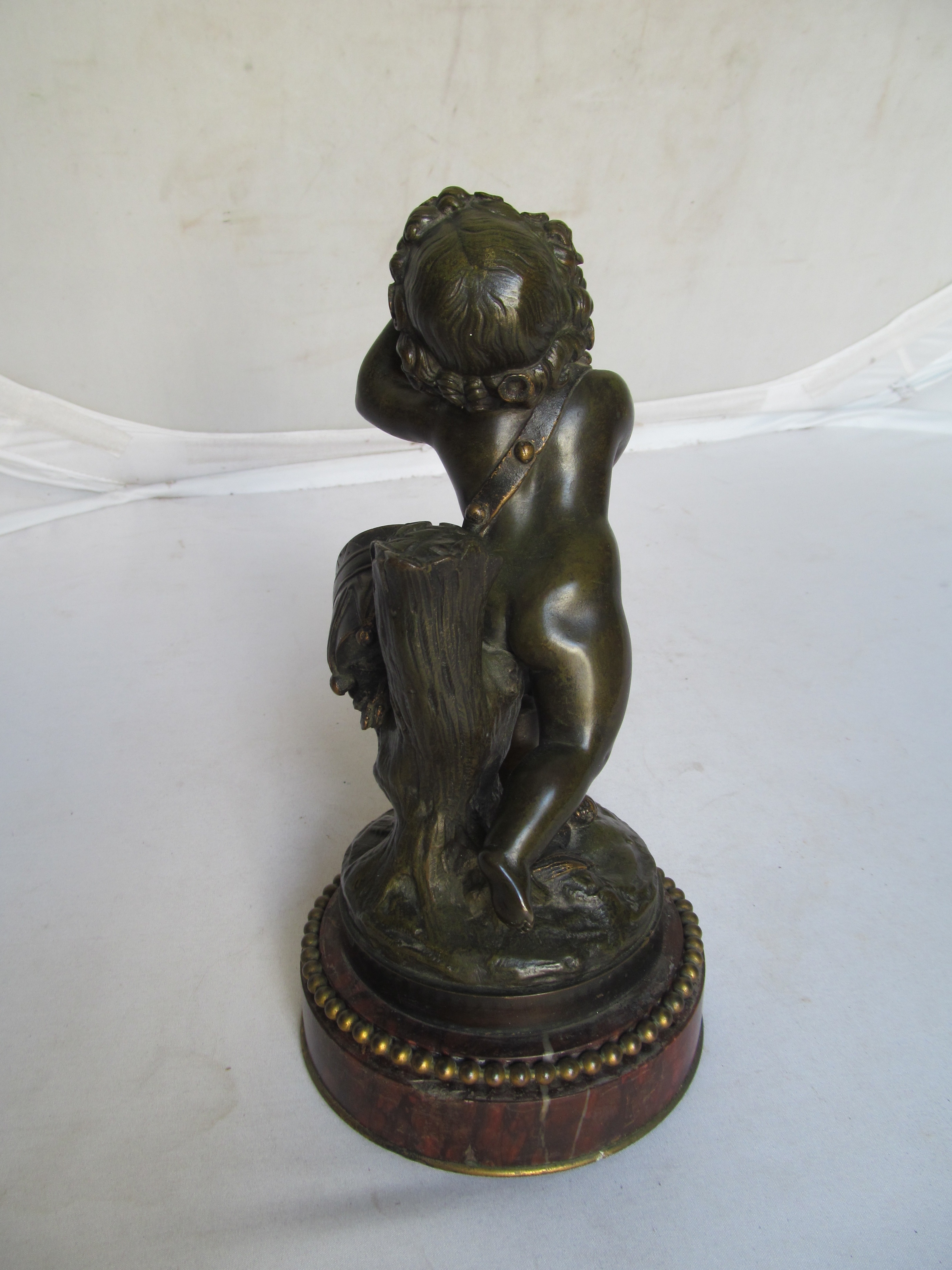 A pair of 19th Century French bronze cherubs one playing drum and carrying a pipe the other a - Image 3 of 10