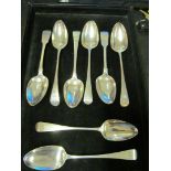 A set of mixed tablespoons.