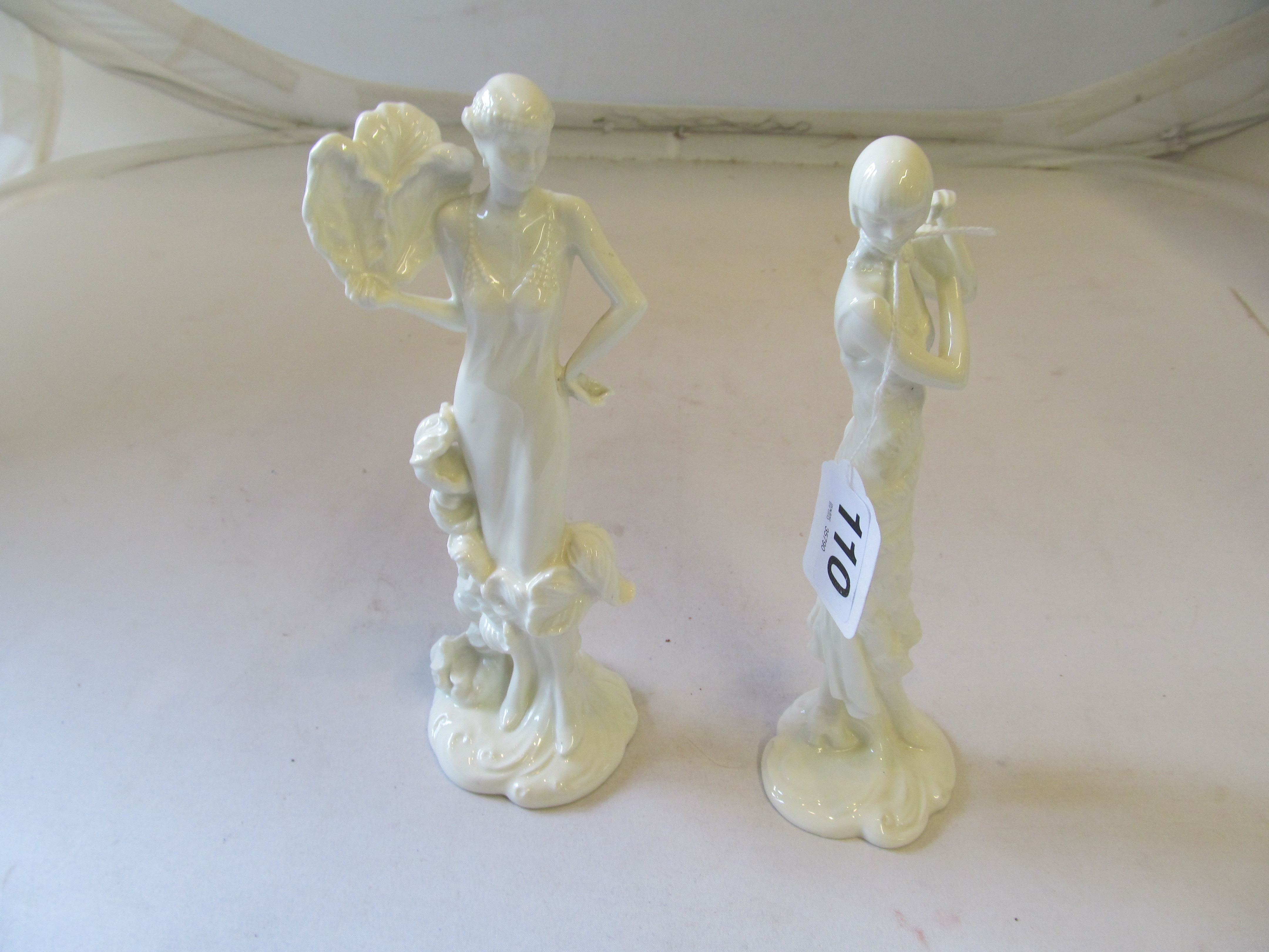 A pair of Royal Worcester 'The 1920s Collection Figures' Irene and Constance.