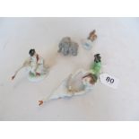 Four small Herend porcelain figures boy on swan, boy chasing swan, an elephant and a deer