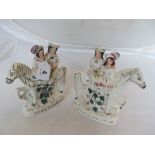 A pair of Staffordshire equestrian models