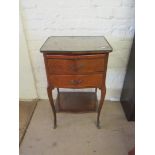 A Louis XV style bedside cabinet with slide, two drawers and lower shelf