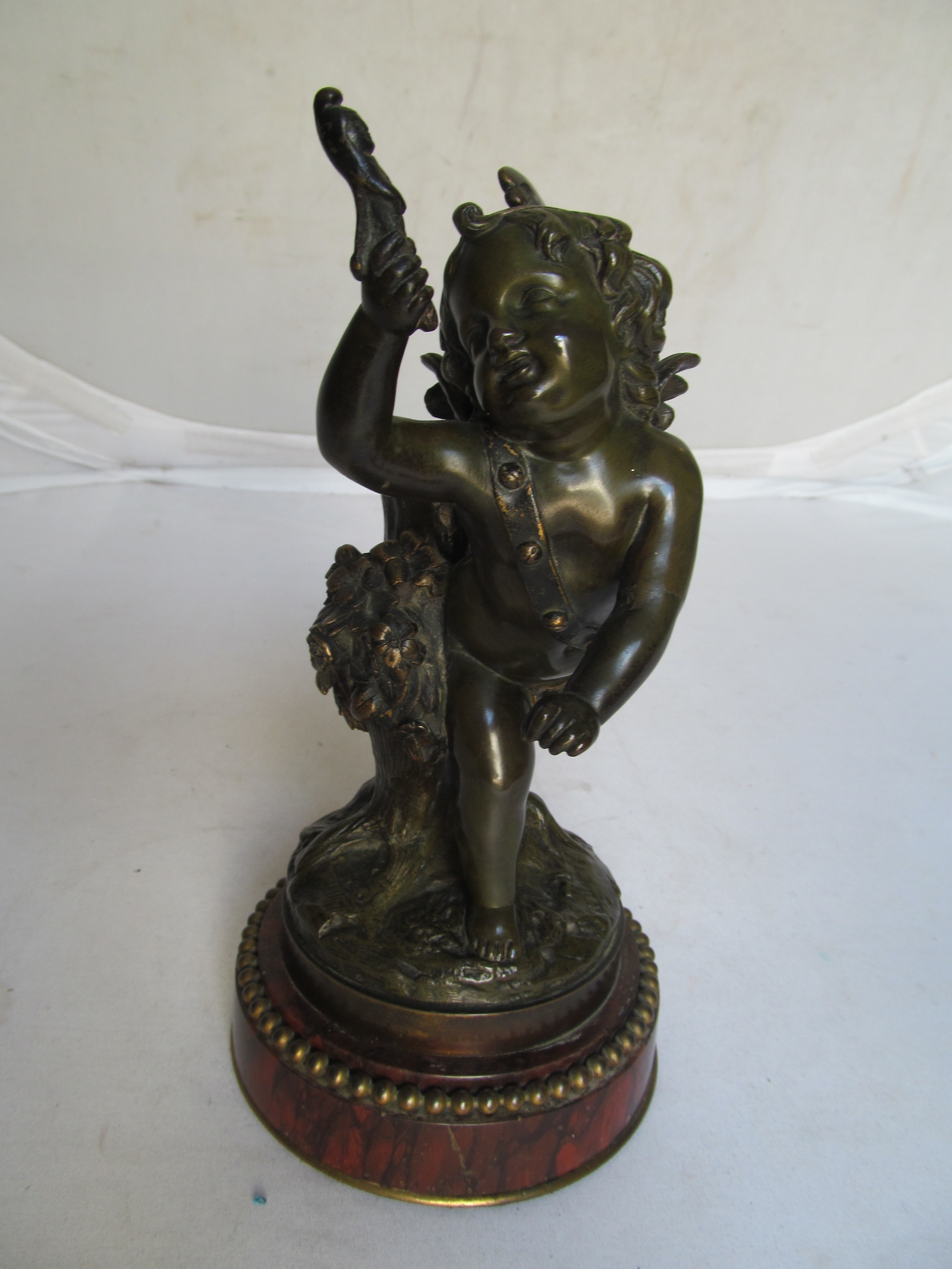 A pair of 19th Century French bronze cherubs one playing drum and carrying a pipe the other a - Image 7 of 10