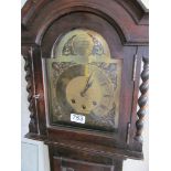 An oak grandmother clock.